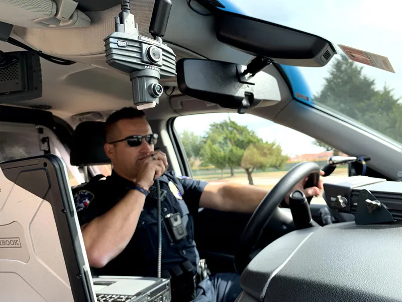 Officer in a cruiser